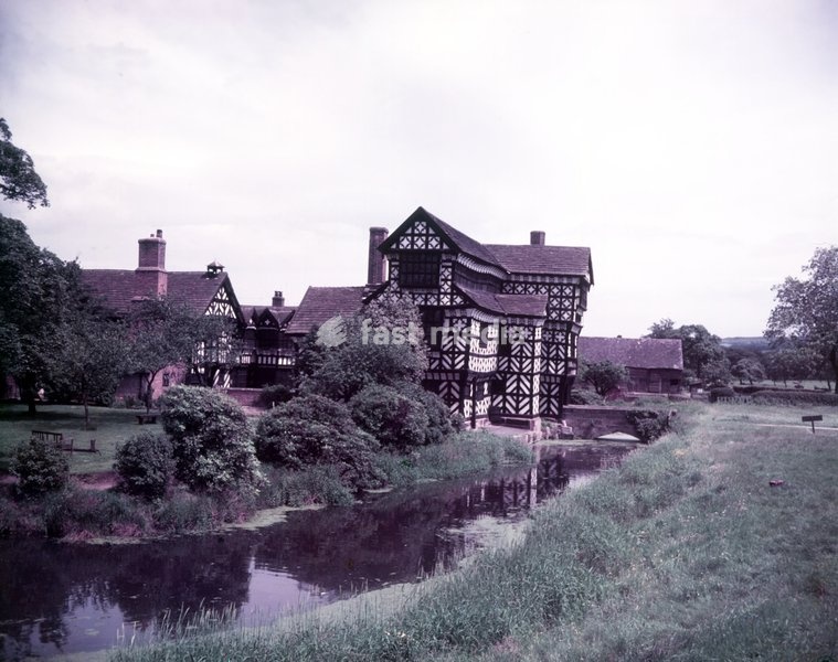 Moreton Old Hall, Cheshire, c1955. Little Moreton Hall, also known as Old Moreton Hall, is a moated half-timbered manor house begun c1504-1508 and built for the prosperous Cheshire landowner William Moreton. It has been described as "a feast of medieval carpentry"
