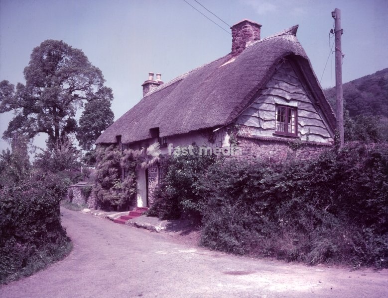 Porlock, Somerset, c1955. The "person on business from Porlock" was an apocryphal unwelcome visitor to Samuel Taylor Coleridge during his composition of the poem "Kubla Khan" in 1797. Coleridge claimed to have perceived the entire course of the poem in a dream (possibly an opium-induced haze), but…