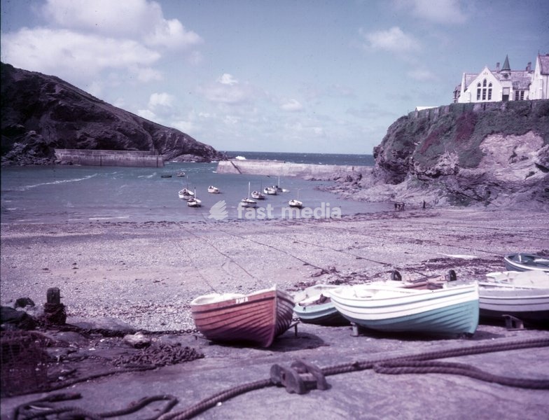 Port Isaac, Cornwall, c1955. Small fishing village on the Atlantic coast of north Cornwall. From 2004 to 2022, the village served as the backdrop to the ITV television series "Doc Martin". It is also home to the sea-shanty singing group Fisherman's Friends