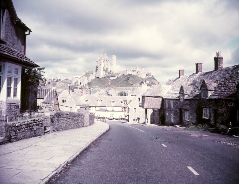 Corfe Castle, Dorset, c1955. View of the village and the ruins of the castle, destroyed by Parliamentarian forces in 1646 after its resistance to their siege during the English Civil War