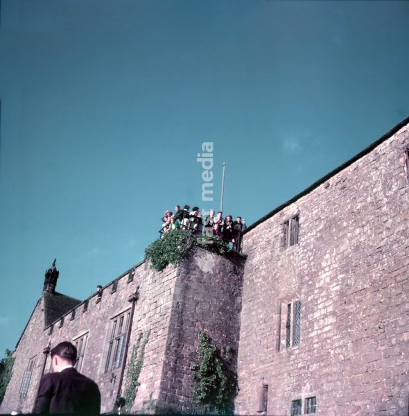 St Briavel's Castle, Forest of Dean, c1955. Ceremony of cheese-rolling - play on castle walls. The St Briavels Bread and Cheese Dole (or Scramble) tradition is said to date back to the 12th century. Each year on Whit Sunday bread and cheese is thrown from the wall of the castle to local 'Dole…