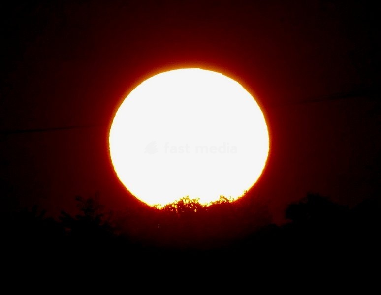 The days sun rise over the countryside