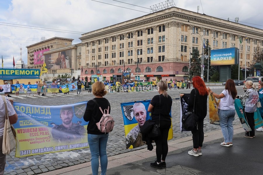 Activists hold banners outside the Kharkiv Regional Military Administration building facing Svobody Square during the “Don’t Stay Silent! Captivity Kills!” rally in Kharkiv, Ukraine, July 12, 2026. In the northeastern Ukrainian city, families of Ukrainian prisoners of war and missing military…