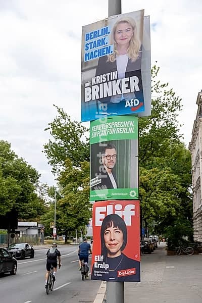 Posters of the candidates for the office of Governing Mayor of Berlin: Kristin Brinker (AfD), Werner Graf (Greens) and Elif Eralp (Die Linke) – Election posters of the parties for the 20th election to the Berlin House of Representatives and the district councils, Berlin city centre, Berlin, 7…