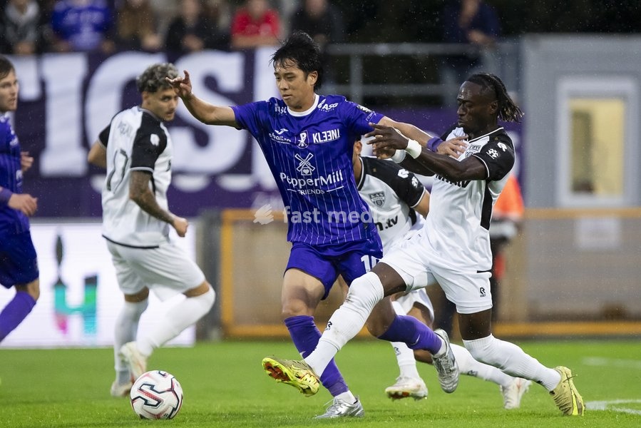 Patro Eisden's Tsubasa Kasayanagi; Eupen's Amadou Keita pictured during a soccer match between Patro Eisden Maasmechelen and KAS Eupen, Sunday 13 September 2026 in Maasmechelen, on day 5 of the 2026-2027 'Challenger Pro League' second highest division of the Belgian championship