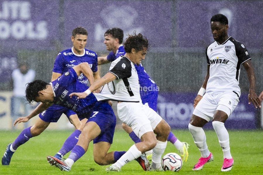 Patro Eisden's Seok-Ju Hong and Eupen's Mathias Fixelles pictured during a soccer match between Patro Eisden Maasmechelen and KAS Eupen, Sunday 13 September 2026 in Maasmechelen, on day 5 of the 2026-2027 'Challenger Pro League' second highest division of the Belgian championship