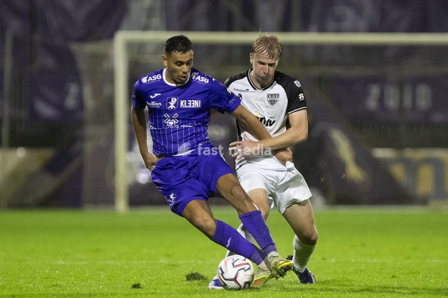 Patro's Zakaria Atteri and Eupen's Rune Paeshuyse pictured during a soccer match between Patro Eisden Maasmechelen and KAS Eupen, Sunday 13 September 2026 in Maasmechelen, on day 5 of the 2026-2027 'Challenger Pro League' second highest division of the Belgian championship