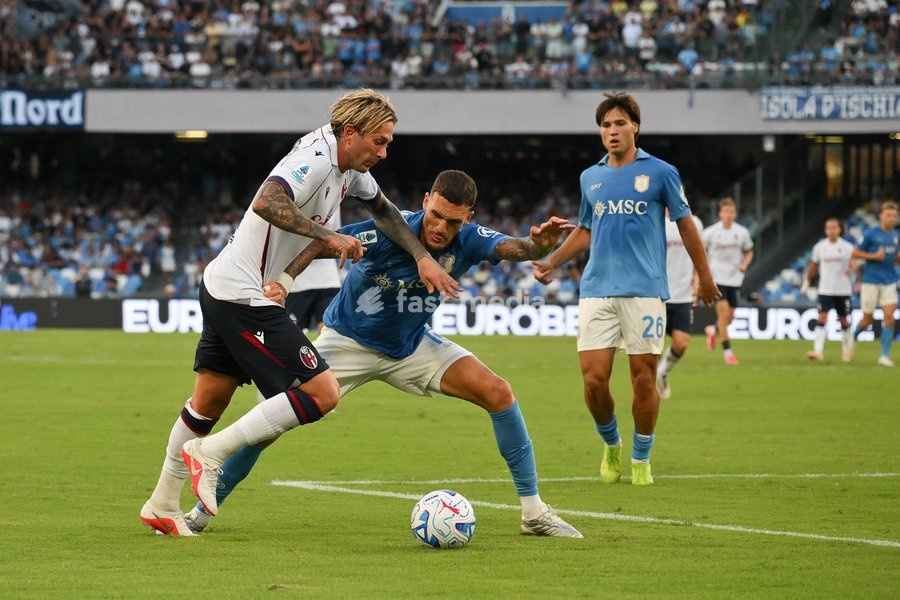 Federico Bernardeschi of Bologna under pressure from Rafa Marin of Napoli during the match of Serie A Enilive Football Match between Napoli vs Bologna at the Maradona Stadium on 13 September 2026 in Napoli, Bologna. Napoli-Bologna 1-1