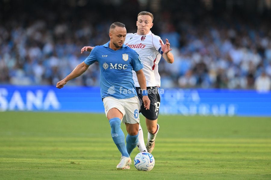 Stanislav Lobotka of Napoli under pressure from Lewis Ferguson of Bologna during the match of Serie A Enilive Football Match between Napoli vs Bologna at the Maradona Stadium on 13 September 2026 in Napoli, Bologna. Napoli-Bologna 1-1