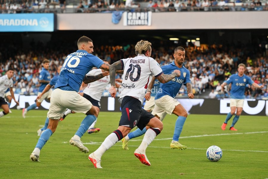 Federico Bernardeschi of Bologna under pressure from Rafa Marin of Napoli during the match of Serie A Enilive Football Match between Napoli vs Bologna at the Maradona Stadium on 13 September 2026 in Napoli, Bologna. Napoli-Bologna 1-1