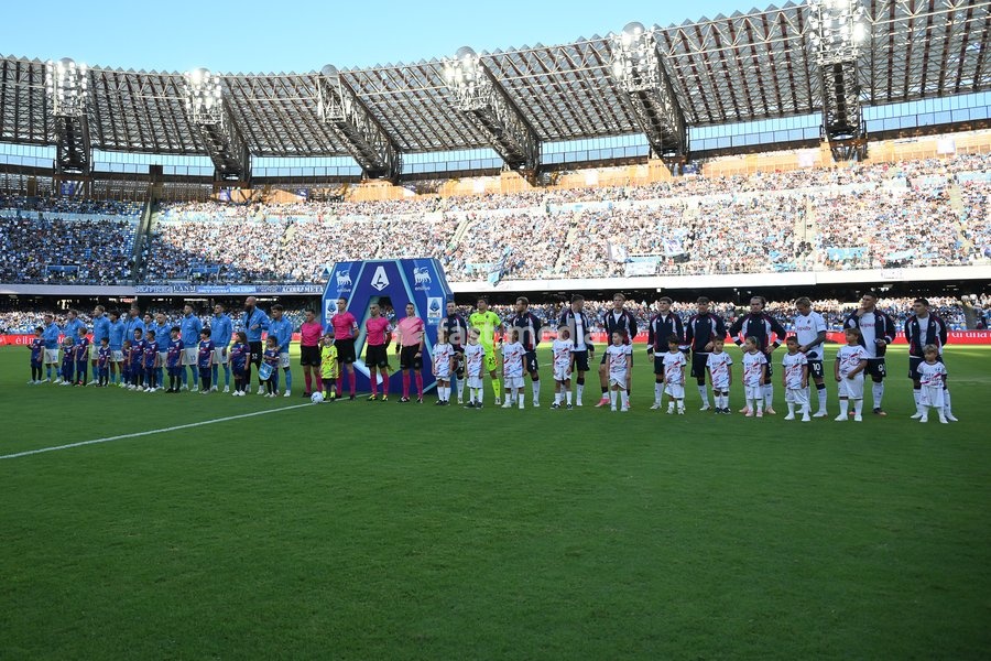 the teams of Napoli and Bologna during the league anthem during the match of Serie A Enilive Football Match between Napoli vs Bologna at the Maradona Stadium on 13 September 2026 in Napoli, Bologna. Napoli-Bologna 1-1