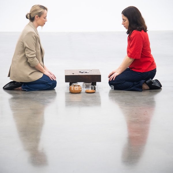 Staff members view 'Visible Labor' (2015) by Gabriel Orozco featuring acrylic on wood, Buddha figures, miniature car models, a GO board game and stones at a photocall for artist Gabriel Orozco's solo exhibition 'Chronotopic' at White Cube Bermondsey, London, England, UK on Monday 14 September, 2026