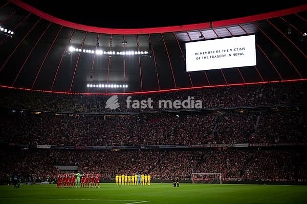 Minute of silence Remembrance by players FC Bayern Munich and Bodö Glimt for the victims of the flood disaster in Nepal 2026 UEFA Football Champions League CL Allianz Arena, Munich, Bayern, Germany