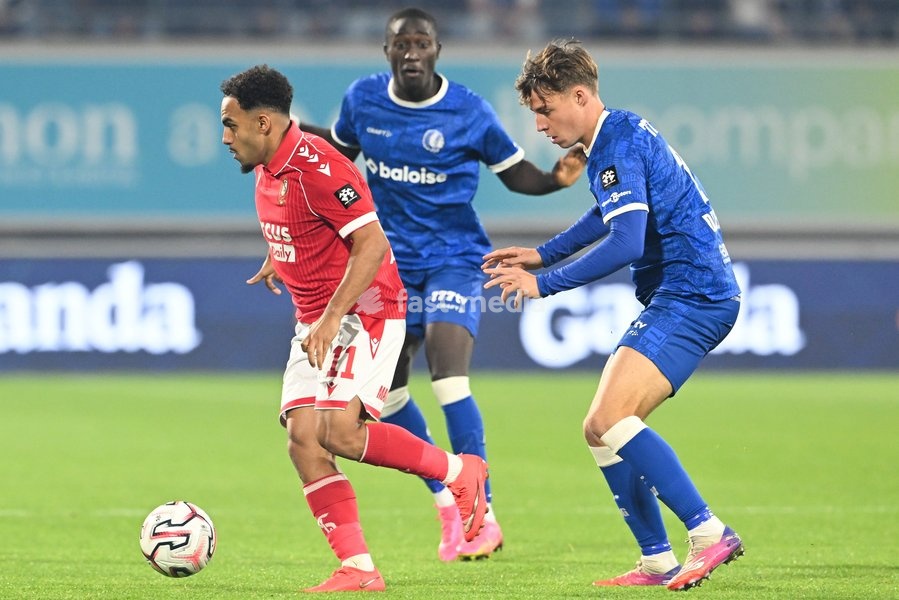 Standard's Adnane Abid; Gent's Mouhamed El Bachir Ngom and Gent's Tibe De Vlieger pictured in action during a soccer match between KAA Gent and Standard de Liege, Friday 18 September 2026 in Gent, on day 7 of the 2026-2027 'Jupiler Pro League' first division of the Belgian championship