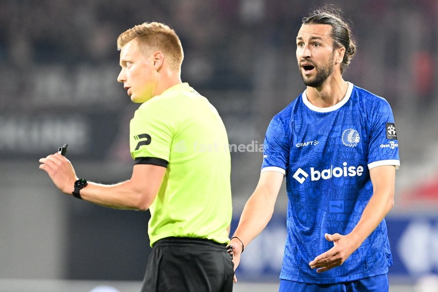 referee Lothar D'Hondt and Gent's Christian Burgess pictured during a soccer match between KAA Gent and Standard de Liege, Friday 18 September 2026 in Gent, on day 7 of the 2026-2027 'Jupiler Pro League' first division of the Belgian championship