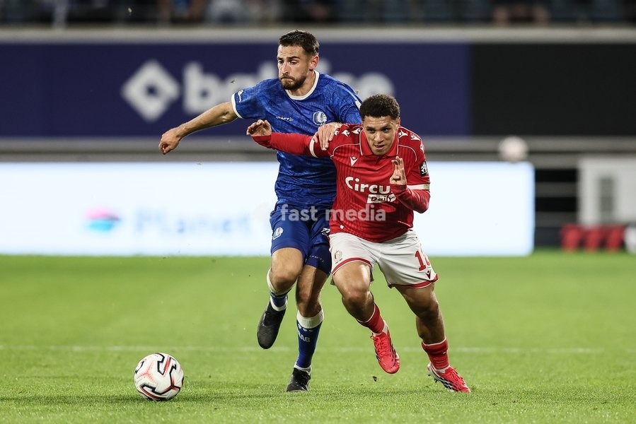 Gent's Matties Volckaert and Standard's Henry Lawrence fight for the ball during a soccer match between KAA Gent and Standard de Liege, Friday 18 September 2026 in Gent, on day 7 of the 2026-2027 'Jupiler Pro League' first division of the Belgian championship