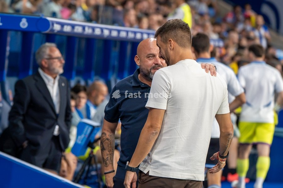 RCD Espanyol head coach Manolo González and Elche CF head coach Martín Anselmi greet each other prior to the LaLiga EA Sports matchday 7 football match between RCD Espanyol and Elche CF at Stage Front Stadium on September 18, 2026 in Cornellà de Llobregat, Spain