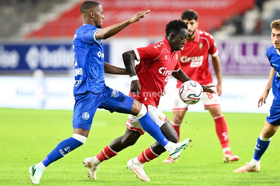 Gent's Michel-Ange Sumai Balikwisha and Standard's Salieu Drammeh pictured in action during a soccer match between KAA Gent and Standard de Liege, Friday 18 September 2026 in Gent, on day 7 of the 2026-2027 'Jupiler Pro League' first division of the Belgian championship