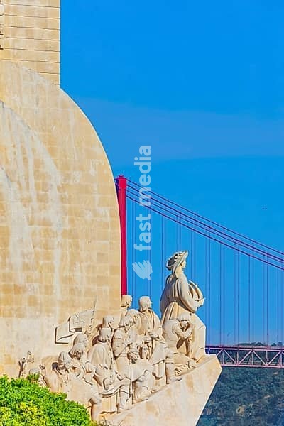 View of Monument to the Discoveries (Padrao dos Descobrimentos) and 25th April bridge in the distance, Belem, Lisbon, Portugal