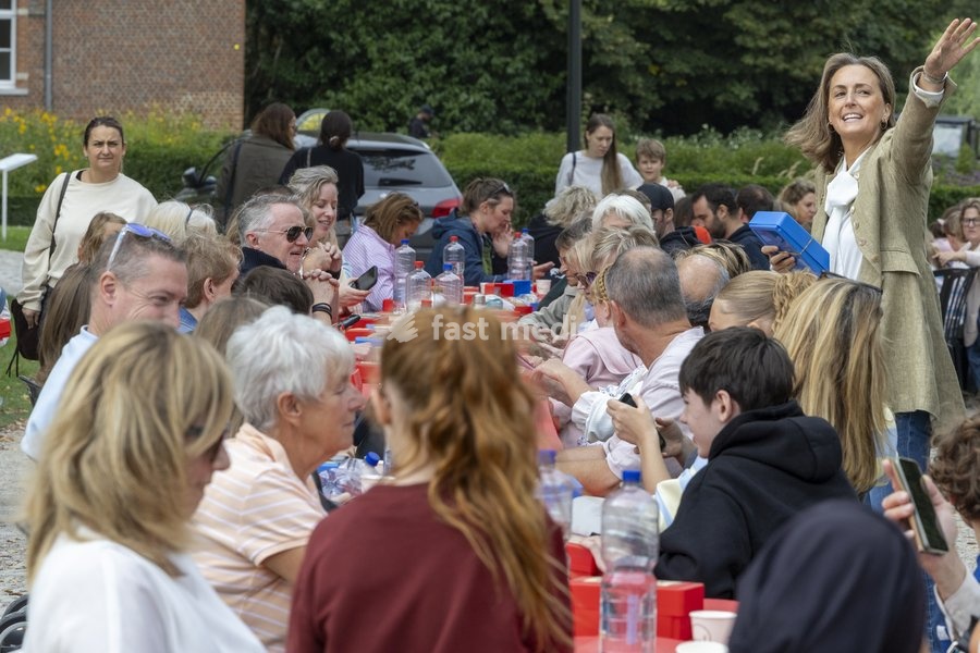 Princess Claire of Belgium (R) pictured during a symbolic initiative by the Queen Paola Foundation to create the longest lunch table, an attempt to break the Belgian record for the longest lunch table, on Saturday 19 September 2026 at the Botanic Garden, in Meise
