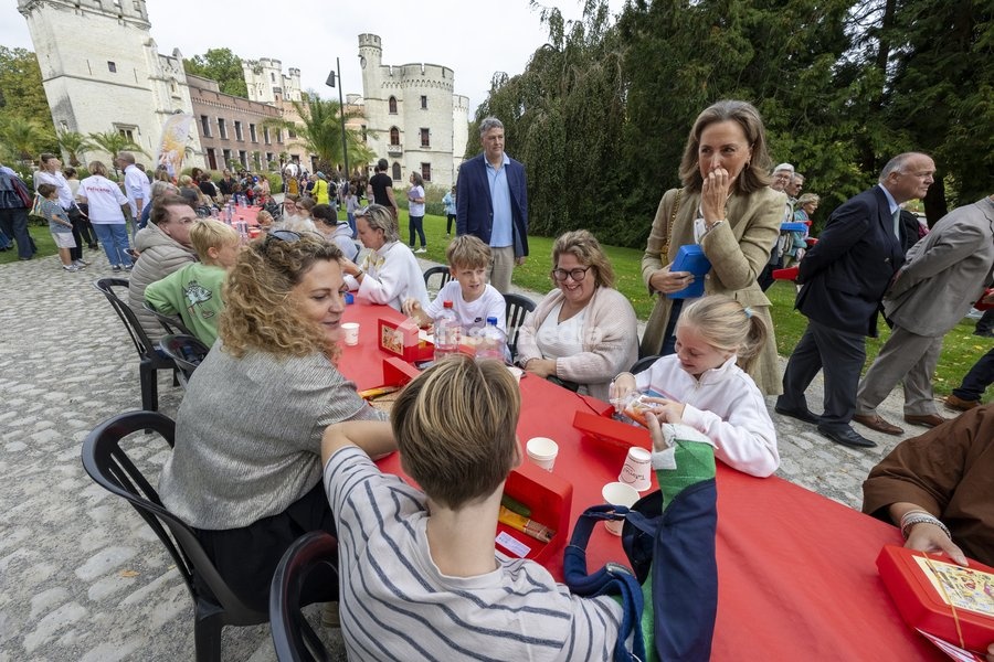 Princess Claire of Belgium (R) pictured during a symbolic initiative by the Queen Paola Foundation to create the longest lunch table, an attempt to break the Belgian record for the longest lunch table, on Saturday 19 September 2026 at the Botanic Garden, in Meise