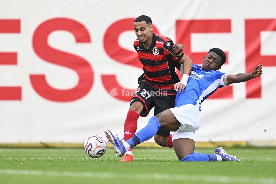 Seraing's Amine Messoussa and Jong Genk's Emmanuel Sarfo fight for the ball during a soccer match between Jong Genk (U21) and RFC Seraing, Saturday 19 September 2026 in Genk, on day 6 of the 2026-2027 'Challenger Pro League' 1B second division of the Belgian championship