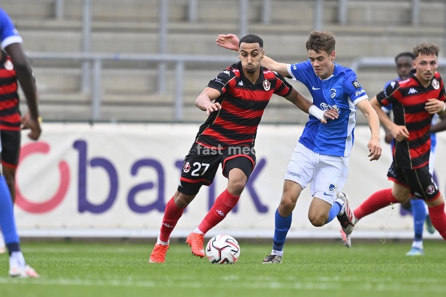 Seraing's Amine Messoussa and Jong Genk's August De Wannemacker fight for the ball during a soccer match between Jong Genk (U21) and RFC Seraing, Saturday 19 September 2026 in Genk, on day 6 of the 2026-2027 'Challenger Pro League' 1B second division of the Belgian championship
