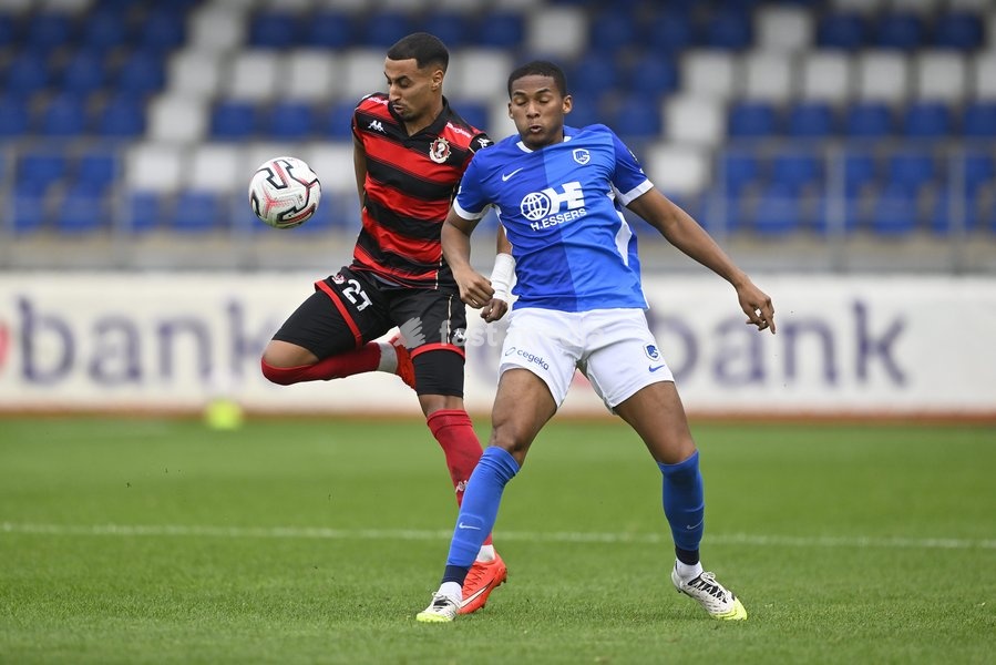 Seraing's Amine Messoussa and Jong Genk's Adrian Palacios fight for the ball during a soccer match between Jong Genk (U21) and RFC Seraing, Saturday 19 September 2026 in Genk, on day 6 of the 2026-2027 'Challenger Pro League' 1B second division of the Belgian championship