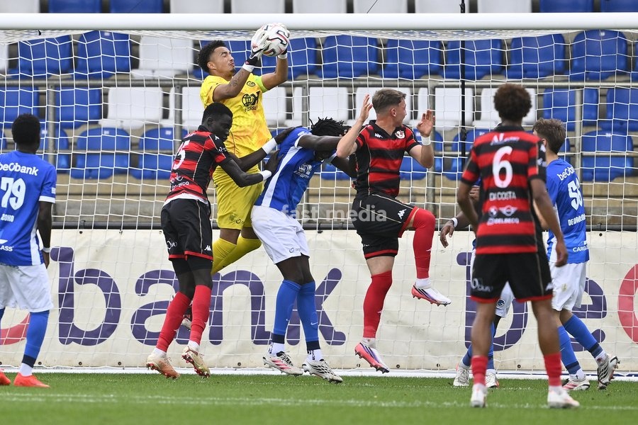 Jong Genk's goalkeeper Emile Doucoure fights for the ball during a soccer match between Jong Genk (U21) and RFC Seraing, Saturday 19 September 2026 in Genk, on day 6 of the 2026-2027 'Challenger Pro League' 1B second division of the Belgian championship