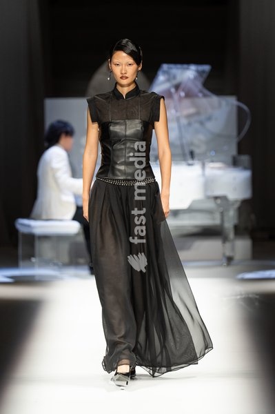 LONDON, ENGLAND - SEPTEMBER 19: A model walks the runway at the Hu Bing Selects: Urban Grace show during London Fashion Week 2026 on September 19, 2026 in London, England