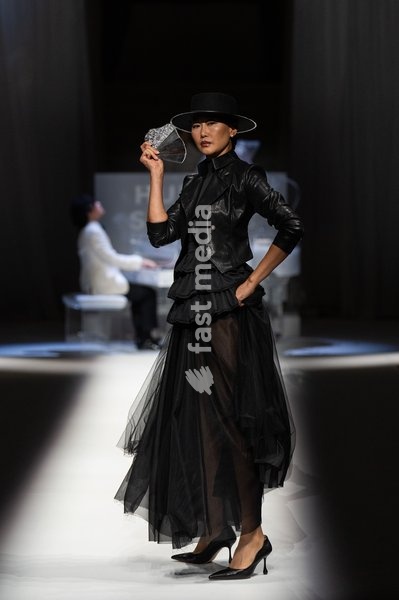 LONDON, ENGLAND - SEPTEMBER 19: A model walks the runway at the Hu Bing Selects: Urban Grace show during London Fashion Week 2026 on September 19, 2026 in London, England