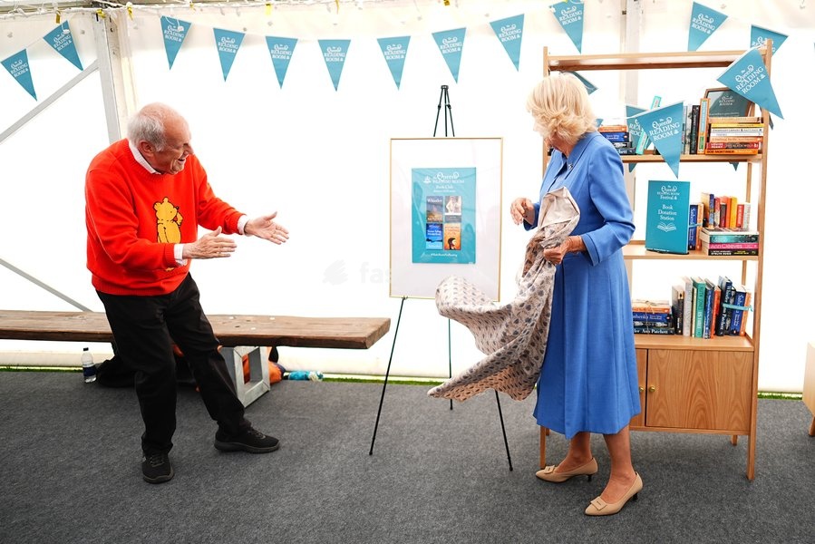 Queen Camilla with Gyles Brandreth as she unveils the titles for the four new books in The Queen's Reading Room Book Club Autumn 2026 season during The Queen's Reading Room Festival at Chatsworth House, Bakewell. Picture date: Saturday September 19, 2026