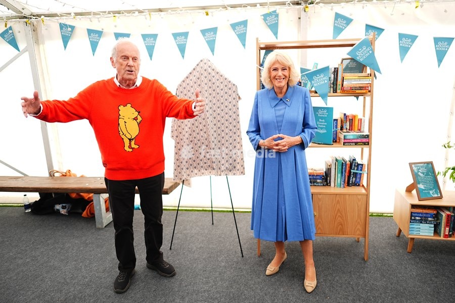 Queen Camilla with Gyles Brandreth as she unveils the titles for the four new books in The Queen's Reading Room Book Club Autumn 2026 season during The Queen's Reading Room Festival at Chatsworth House, Bakewell. Picture date: Saturday September 19, 2026