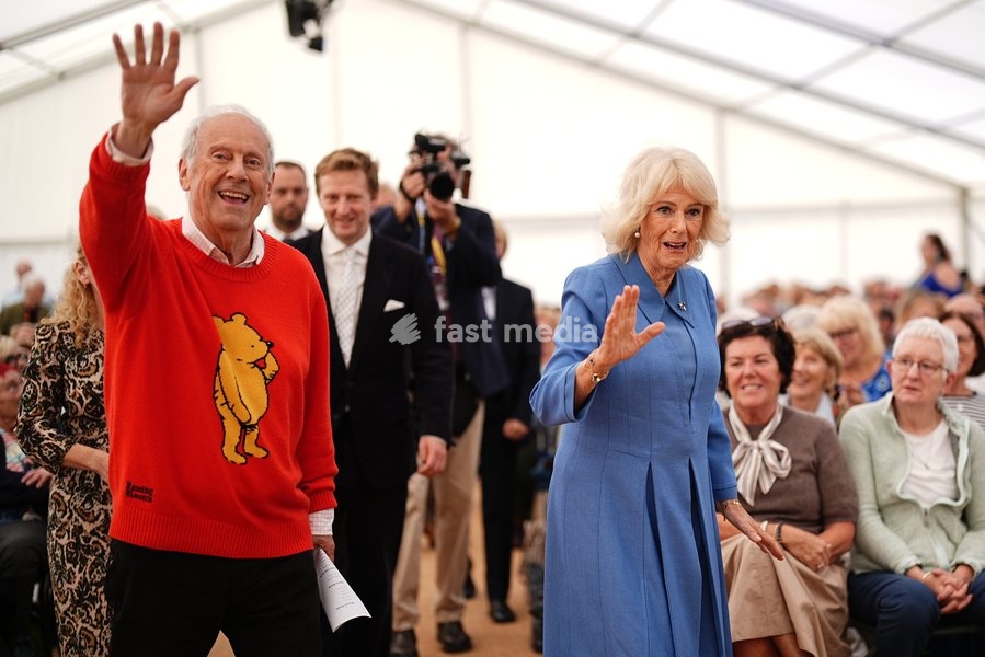 Queen Camilla with Gyles Brandreth in the Garden Stage Marquee during The Queen's Reading Room Festival at Chatsworth House, Bakewell. Picture date: Saturday September 19, 2026