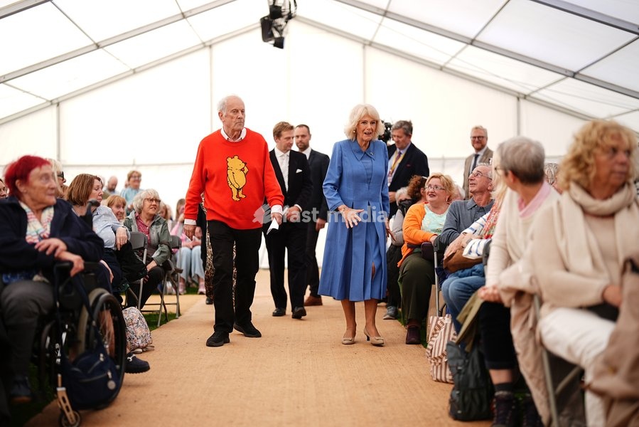 Queen Camilla with Gyles Brandreth in the Garden Stage Marquee during The Queen's Reading Room Festival at Chatsworth House, Bakewell. Picture date: Saturday September 19, 2026
