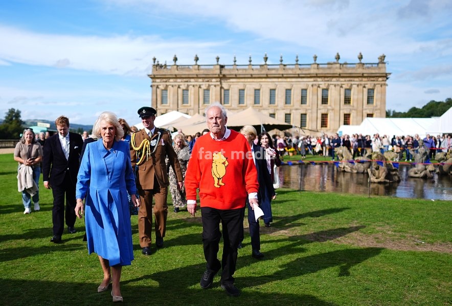 Queen Camilla with Gyles Brandreth as she attends the The Queen's Reading Room Festival at Chatsworth House, Bakewell. Picture date: Saturday September 19, 2026