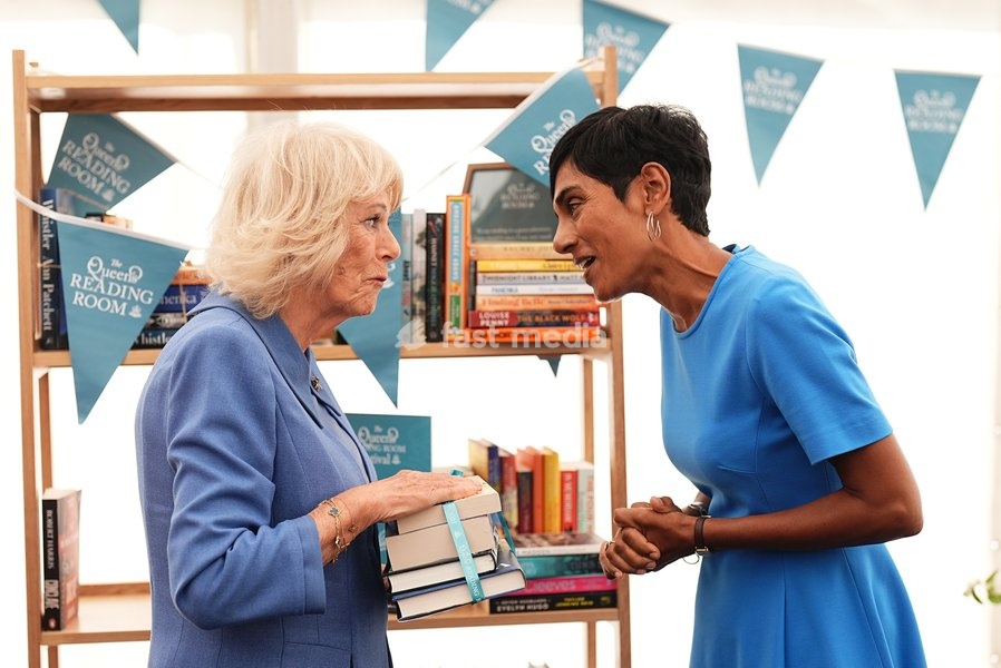 Queen Camilla speaking to author Reeta Chakrabarti, whose book, Finding Belle, has the list for The Queen's Reading Room Book Club Autumn 2026 season, during The Queen's Reading Room Festival at Chatsworth House, Bakewell. Picture date: Saturday September 19, 2026