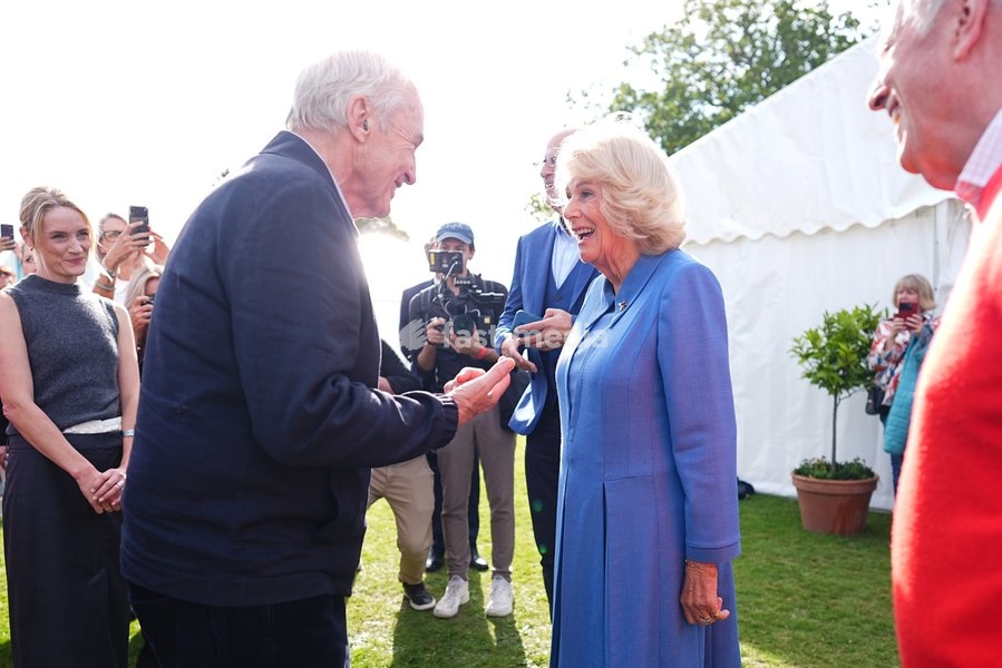 Queen Camilla meeting actor Larry Lamb as she attends the The Queen's Reading Room Festival at Chatsworth House, Bakewell. Picture date: Saturday September 19, 2026