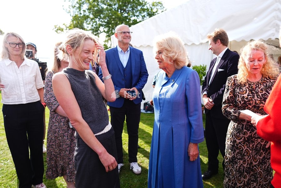 Queen Camilla meeting author Lucy Foley as she attends the The Queen's Reading Room Festival at Chatsworth House, Bakewell. Picture date: Saturday September 19, 2026