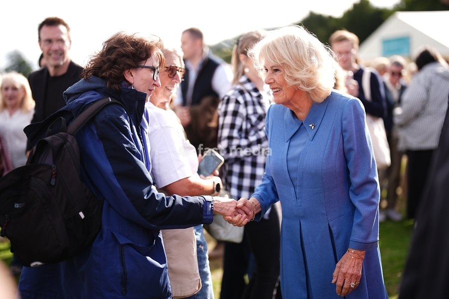 Queen Camilla meeting members of the public as she attends the The Queen's Reading Room Festival at Chatsworth House, Bakewell. Picture date: Saturday September 19, 2026