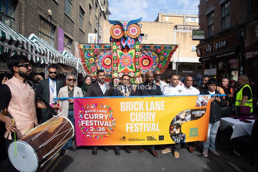 Performers take part in a parade as part of the Annual Brick lane Festival 2026 in Brick Lane, London, England, UK on Sunday 20 September, 2026