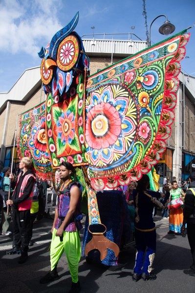 Performers take part in a parade as part of the Annual Brick lane Festival 2026 in Brick Lane, London, England, UK on Sunday 20 September, 2026