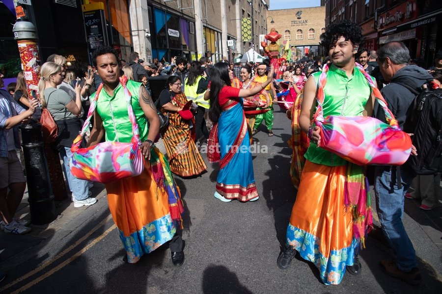 Performers take part in a parade as part of the Annual Brick lane Festival 2026 in Brick Lane, London, England, UK on Sunday 20 September, 2026