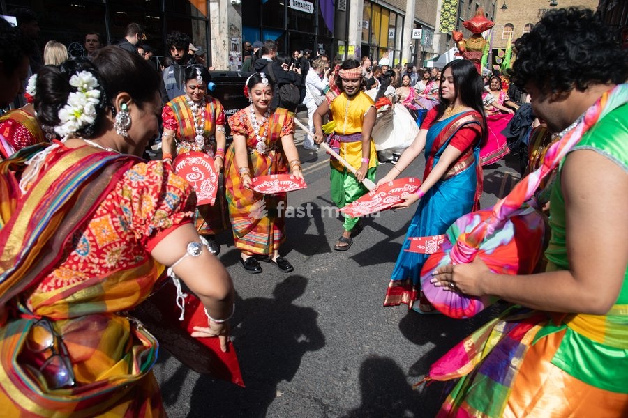 Performers take part in a parade as part of the Annual Brick lane Festival 2026 in Brick Lane, London, England, UK on Sunday 20 September, 2026