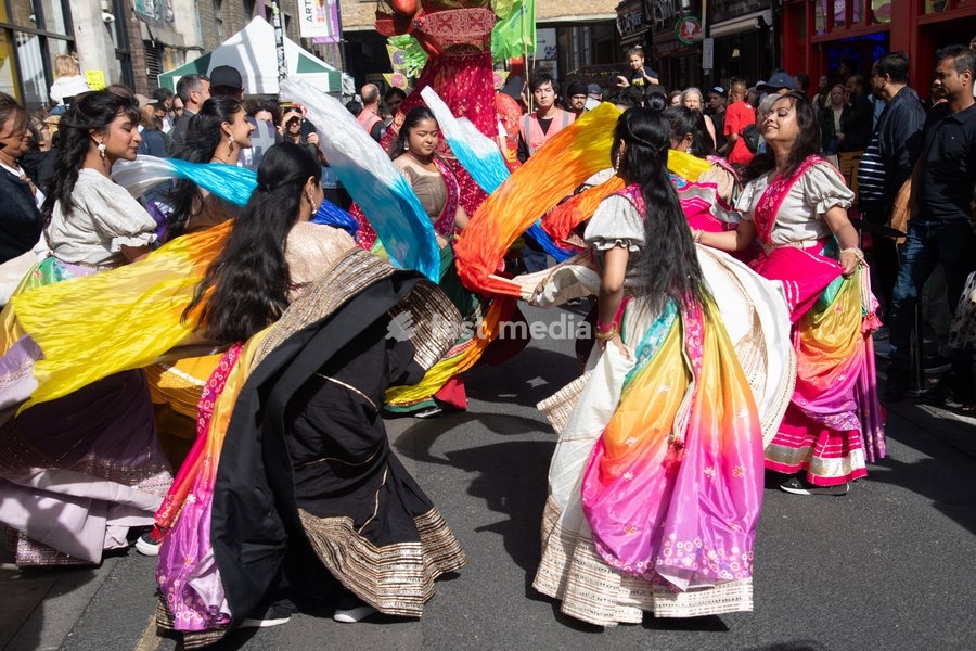 Performers take part in a parade as part of the Annual Brick lane Festival 2026 in Brick Lane, London, England, UK on Sunday 20 September, 2026