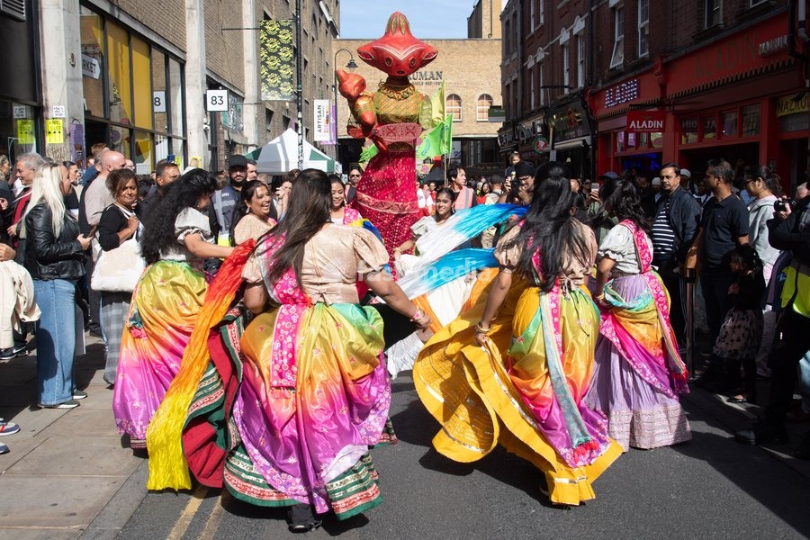 Performers take part in a parade as part of the Annual Brick lane Festival 2026 in Brick Lane, London, England, UK on Sunday 20 September, 2026