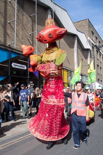Performers take part in a parade as part of the Annual Brick lane Festival 2026 in Brick Lane, London, England, UK on Sunday 20 September, 2026