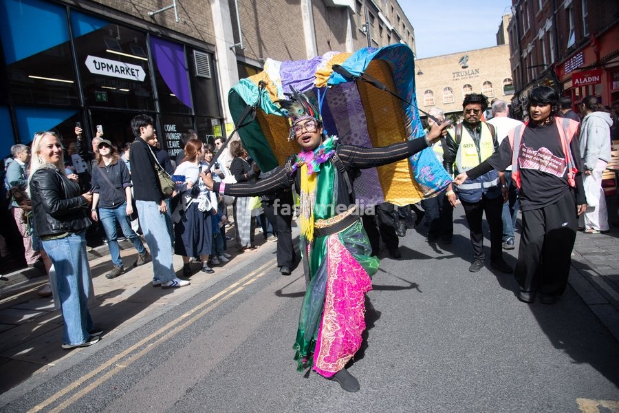 Performers take part in a parade as part of the Annual Brick lane Festival 2026 in Brick Lane, London, England, UK on Sunday 20 September, 2026