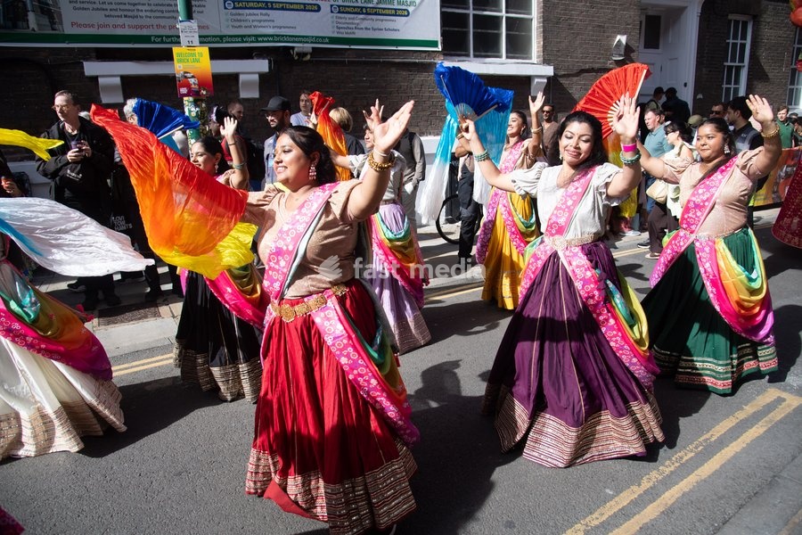 Performers take part in a parade as part of the Annual Brick lane Festival 2026 in Brick Lane, London, England, UK on Sunday 20 September, 2026