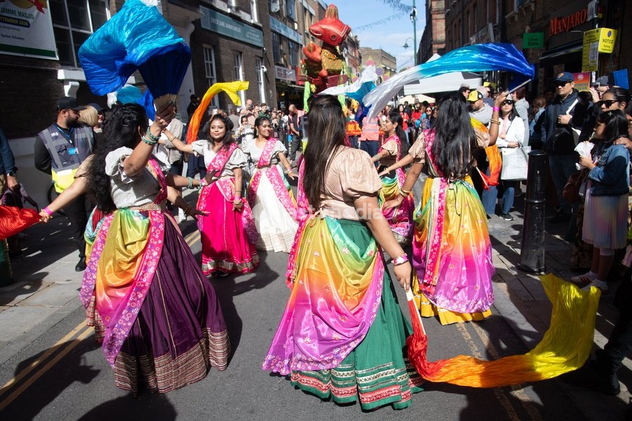 Performers take part in a parade as part of the Annual Brick lane Festival 2026 in Brick Lane, London, England, UK on Sunday 20 September, 2026